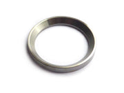 Spacer ring for oil slinger with chamfer