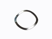 Wave ring for timed breather plate
