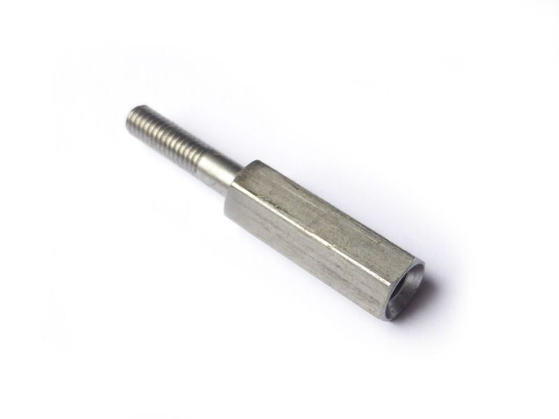 Spacer bolt for generator cover