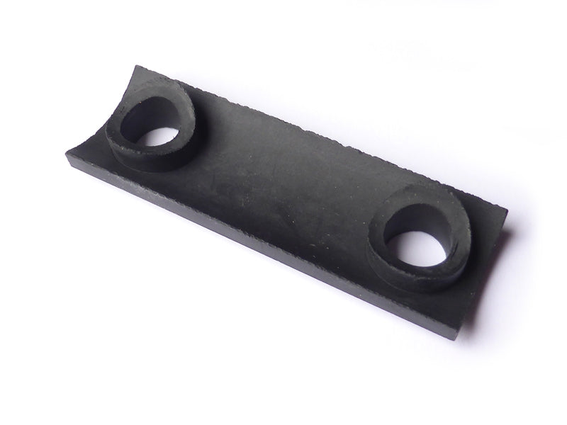 Rubber spacer plate for head light bracket