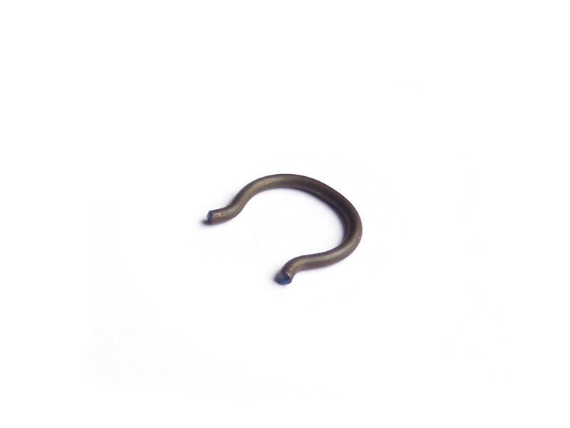 Retaining clip front shock absorber