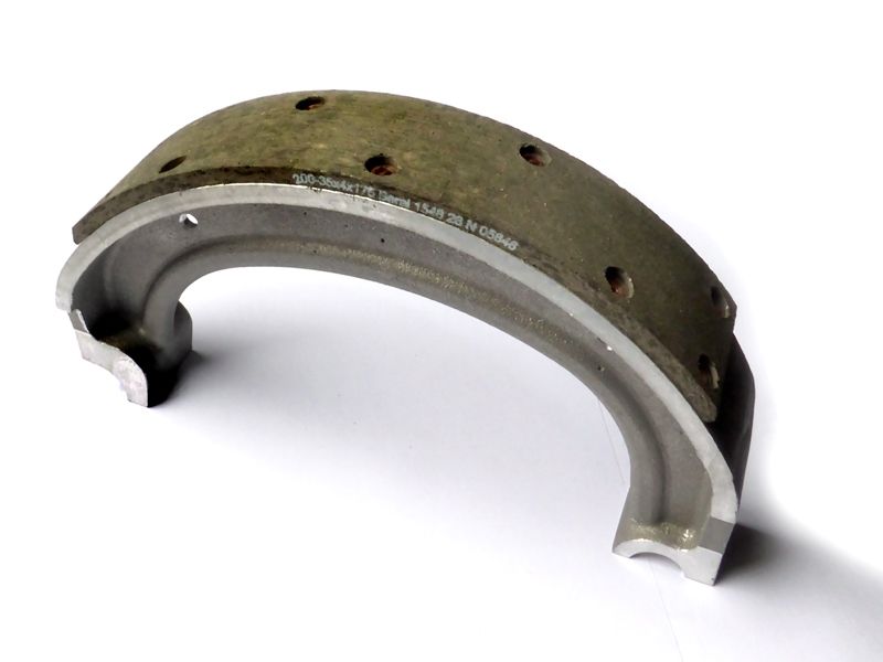 Brake shoe, new, rear, upper, incl. riveted brake lining