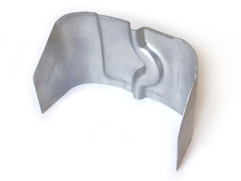 Cable duct end piece in rear fender