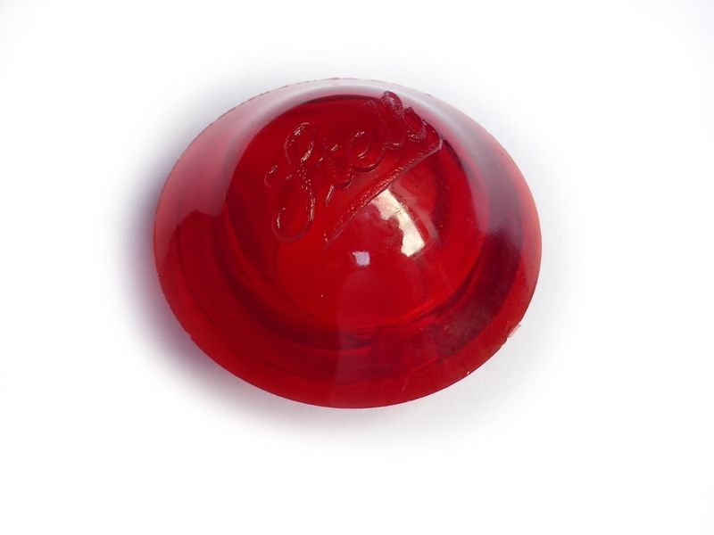Red lens with Steib script
